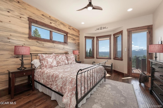 2621 Gcr 519, Tabernash, CO 80478 - bedroom with wooden walls, access to exterior, recessed lighting, wood finished floors, and an accent wall
