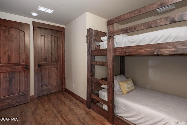 2621 Gcr 519, Tabernash, CO 80478 - unfurnished bedroom with dark wood-type flooring and baseboards