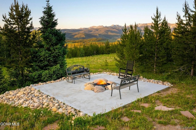 2621 Gcr 519, Tabernash, CO 80478 - view of patio / terrace with a fire pit and a mountain view