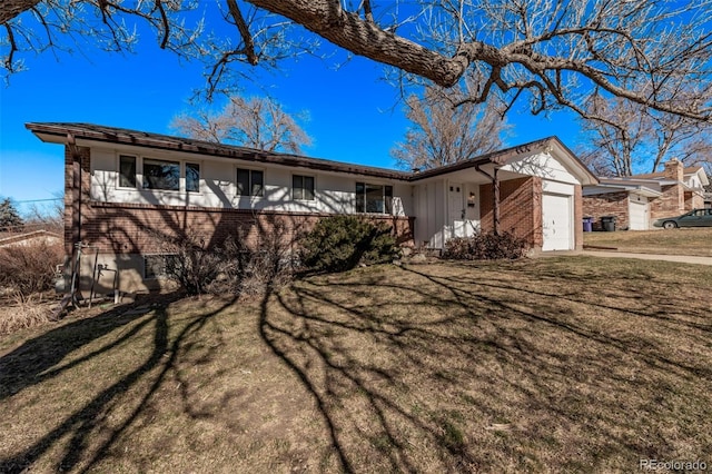 ranch-style house featuring a garage, brick siding, and a front lawn