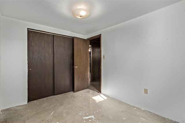 unfurnished bedroom with a closet