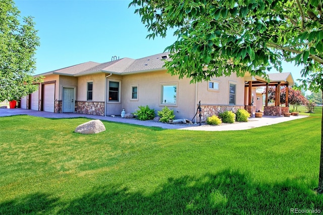 back of house with a garage, stucco siding, and stone siding