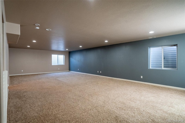 1985 Reed Grass Way, Colorado Springs, CO 80915 - unfurnished room featuring carpet, recessed lighting, and a textured ceiling