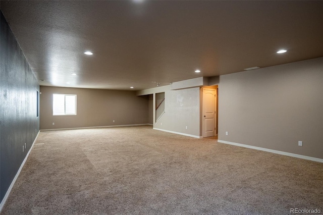 1985 Reed Grass Way, Colorado Springs, CO 80915 - basement featuring recessed lighting and light carpet