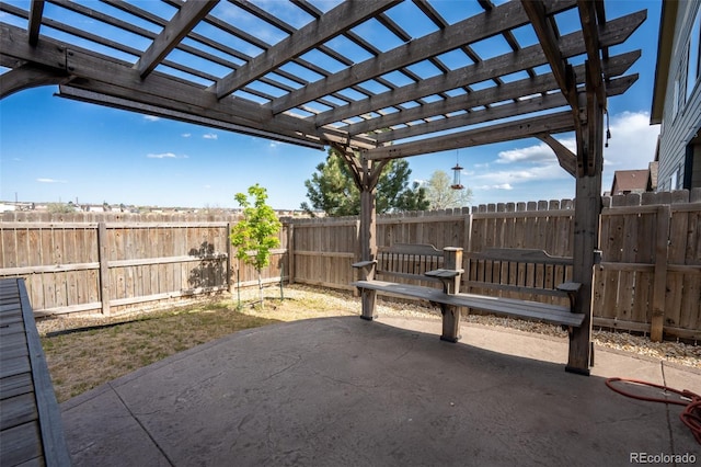 1985 Reed Grass Way, Colorado Springs, CO 80915 - fenced backyard featuring a pergola and a patio