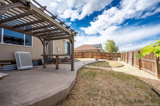 1985 Reed Grass Way, Colorado Springs, CO 80915 - fenced backyard with a patio and a pergola