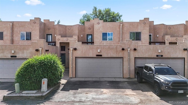 4109 Sunny Vista Hts, Colorado Springs, CO 80918 - view of property featuring a garage and driveway