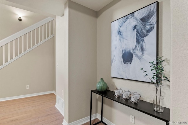 4109 Sunny Vista Hts, Colorado Springs, CO 80918 - hall featuring wood finished floors and stairs