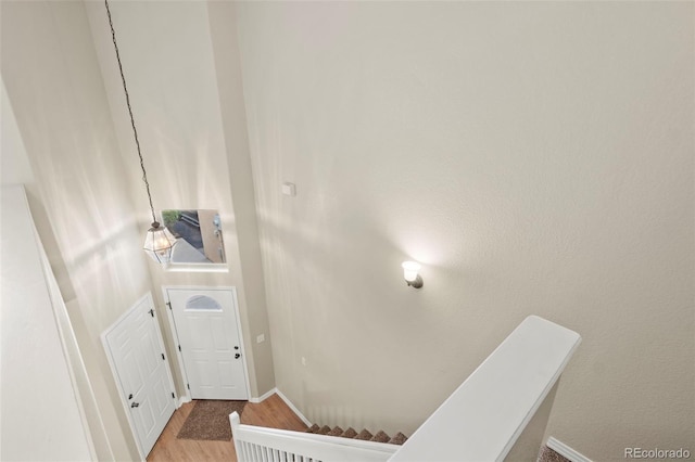 4109 Sunny Vista Hts, Colorado Springs, CO 80918 - staircase with wood finished floors and baseboards