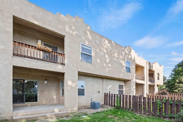 4109 Sunny Vista Hts, Colorado Springs, CO 80918 - rear view of property featuring stucco siding