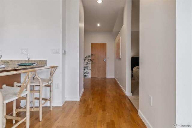 hall featuring light hardwood / wood-style flooring