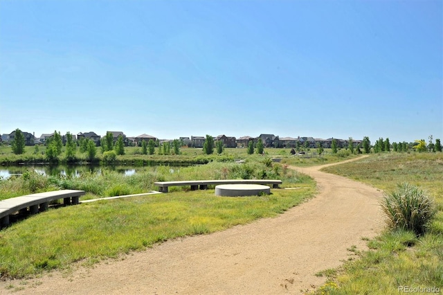 view of property's community featuring a water view