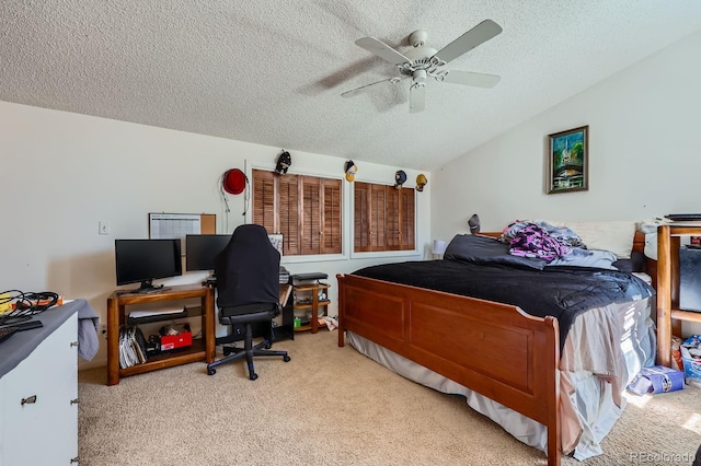 4484 Juniper Ct, Larkspur, CO 80118 - bedroom with a textured ceiling, light carpet, lofted ceiling, ceiling fan, and an office area