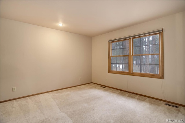 view of carpeted spare room