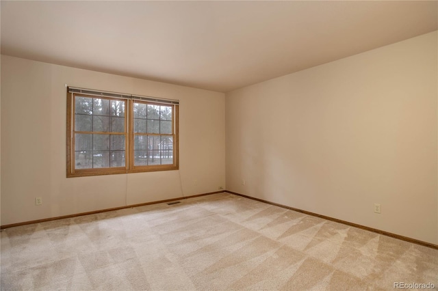 view of carpeted spare room