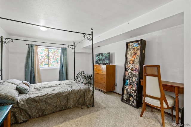 bedroom with light colored carpet