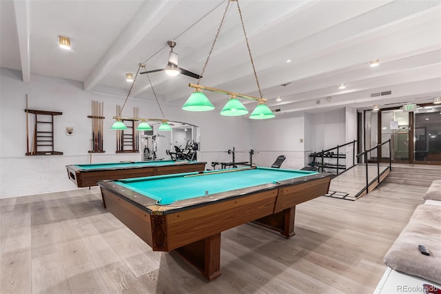 recreation room with light hardwood / wood-style floors, beamed ceiling, and pool table