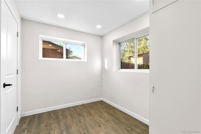 220 S Raleigh St, Denver, CO 80219 - empty room featuring dark wood-style floors and recessed lighting