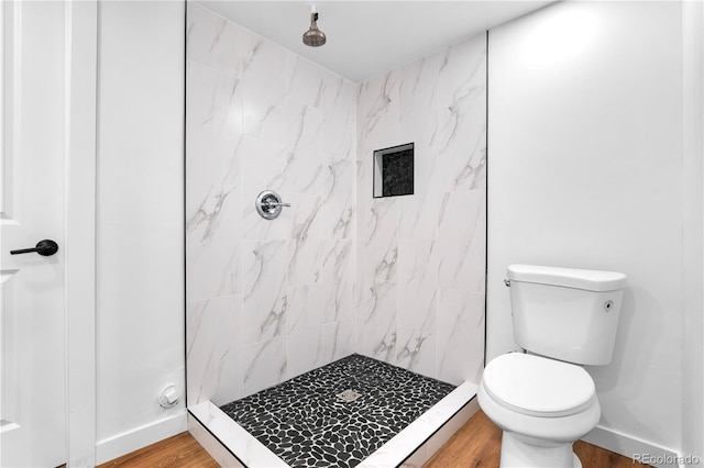 220 S Raleigh St, Denver, CO 80219 - bathroom with a shower stall and wood finished floors