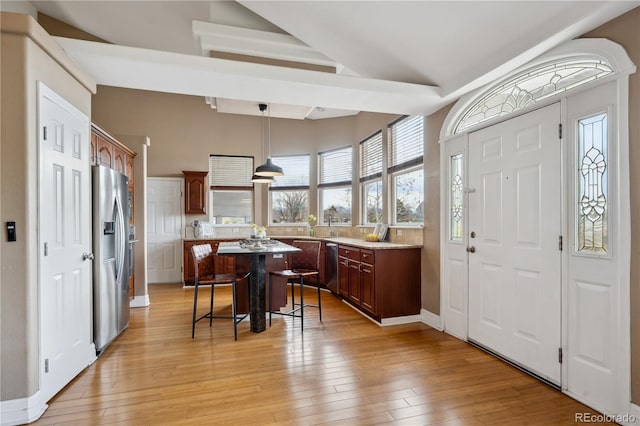 6595 Meade Ct, Arvada, CO 80003 - foyer with light wood finished floors