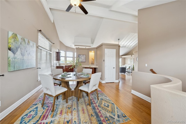 6595 Meade Ct, Arvada, CO 80003 - dining space featuring ceiling fan, light wood finished floors, and baseboards