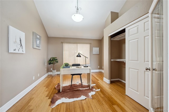 6595 Meade Ct, Arvada, CO 80003 - office with baseboards, light wood-style flooring, and lofted ceiling