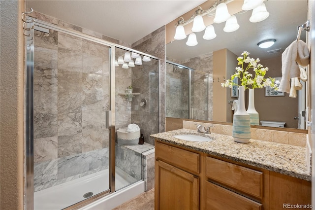 6595 Meade Ct, Arvada, CO 80003 - bathroom featuring vanity and a shower stall