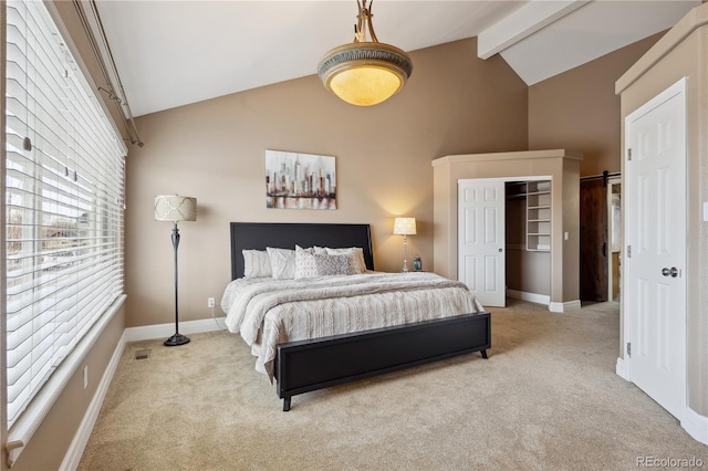 6595 Meade Ct, Arvada, CO 80003 - carpeted bedroom with high vaulted ceiling, baseboards, beamed ceiling, and a barn door