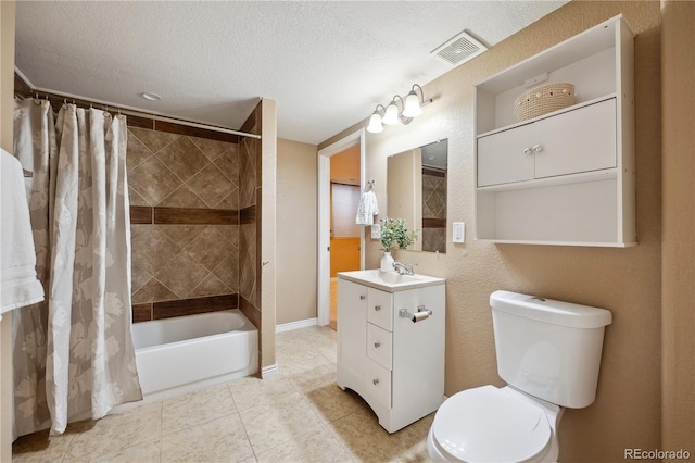 6595 Meade Ct, Arvada, CO 80003 - full bathroom featuring toilet, vanity, shower / tub combo with curtain, tile patterned flooring, and a textured ceiling