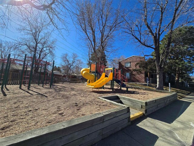 community jungle gym with fence