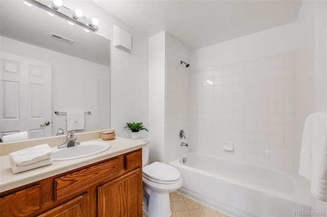 bathroom featuring toilet, visible vents, shower / bathing tub combination, and vanity