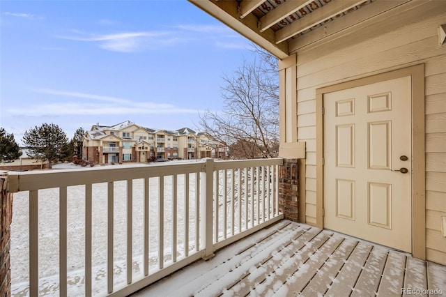 wooden terrace featuring a residential view