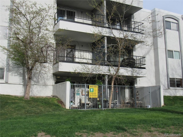 view of property featuring fence