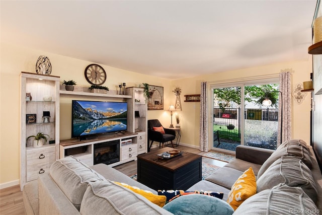 2325 S Linden Ct Unit 101, Denver, CO 80222 - living room with wood finished floors and baseboards