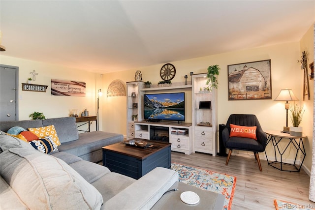 2325 S Linden Ct Unit 101, Denver, CO 80222 - living area featuring wood finished floors and baseboards