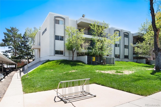 2325 S Linden Ct Unit 101, Denver, CO 80222 - view of property featuring central air condition unit