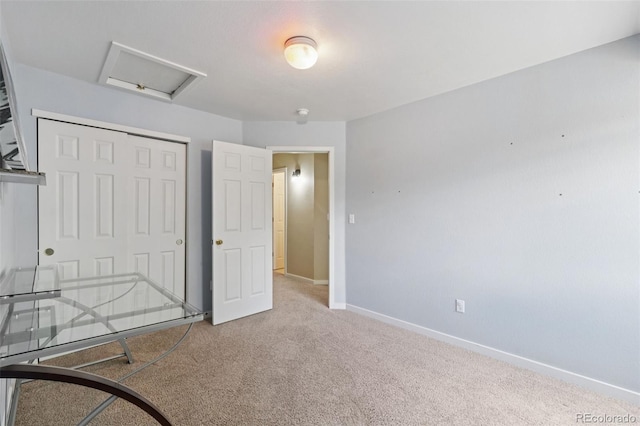 2408 Concord Cir, Lafayette, CO 80026 - unfurnished bedroom featuring carpet floors, attic access, and a closet