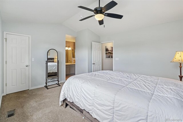 2408 Concord Cir, Lafayette, CO 80026 - bedroom with vaulted ceiling, light colored carpet, connected bathroom, and ceiling fan