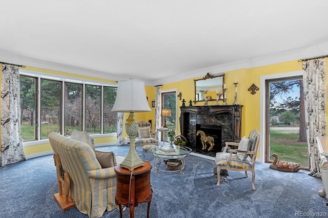 689 Red Deer Rd, Franktown, CO 80116 - living area featuring carpet flooring, plenty of natural light, a premium fireplace, and ornamental molding
