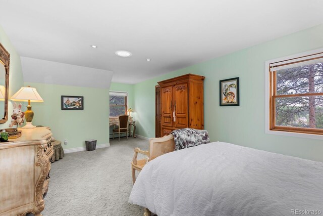 689 Red Deer Rd, Franktown, CO 80116 - bedroom with light colored carpet, baseboards, multiple windows, and recessed lighting