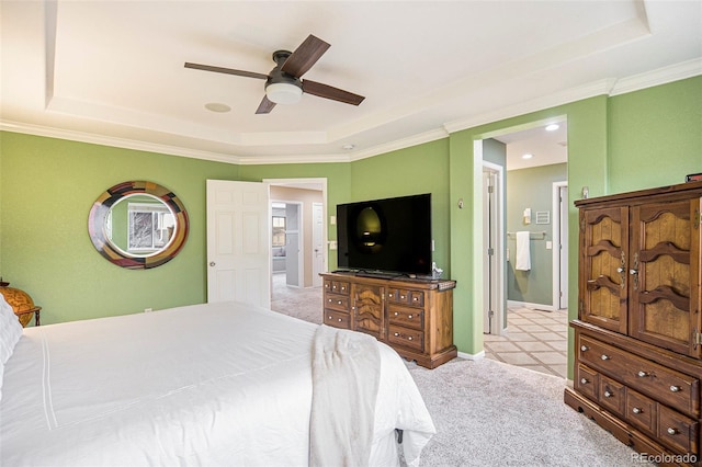 bedroom featuring light colored carpet, a raised ceiling, ceiling fan, and crown molding