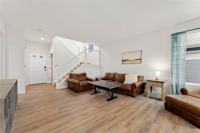 7860 E Ellsworth Ave, Denver, CO 80230 - living area with light wood-style floors, stairs, baseboards, and recessed lighting