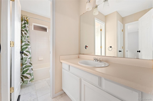 7860 E Ellsworth Ave, Denver, CO 80230 - full bathroom featuring vanity, marble look tiles, shower / bath combination with curtain, and baseboards