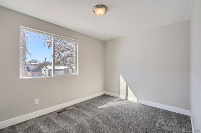 view of carpeted spare room