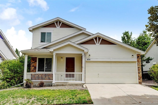 view of front facade featuring a garage and covered porch