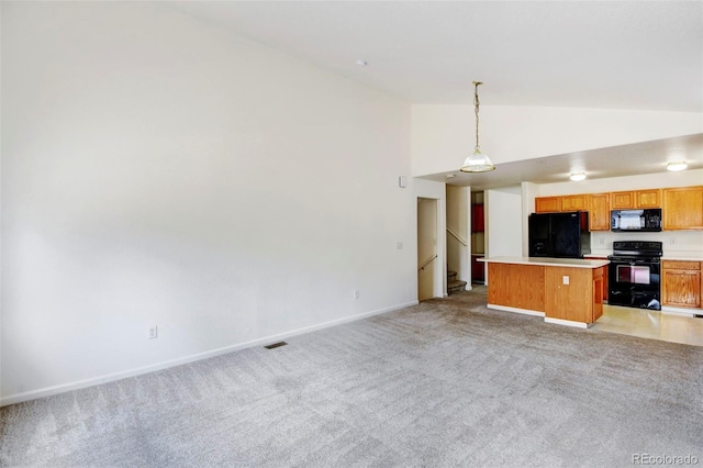 kitchen featuring decorative light fixtures, a center island, high vaulted ceiling, light carpet, and black appliances