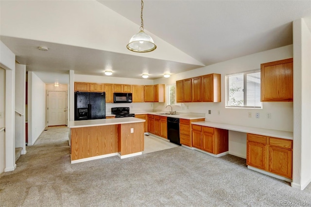 kitchen featuring a kitchen island, decorative light fixtures, lofted ceiling, sink, and black appliances