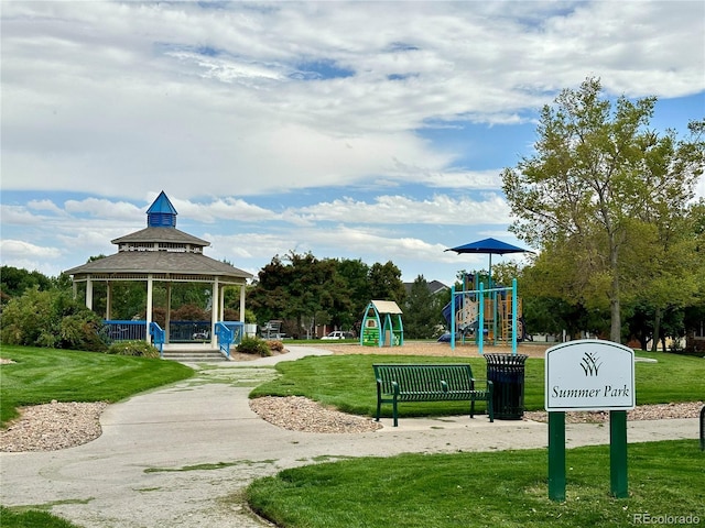 view of property's community featuring a gazebo, a yard, and a playground