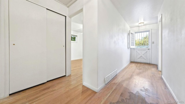 hall featuring light hardwood / wood-style floors