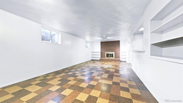 unfurnished living room featuring a fireplace